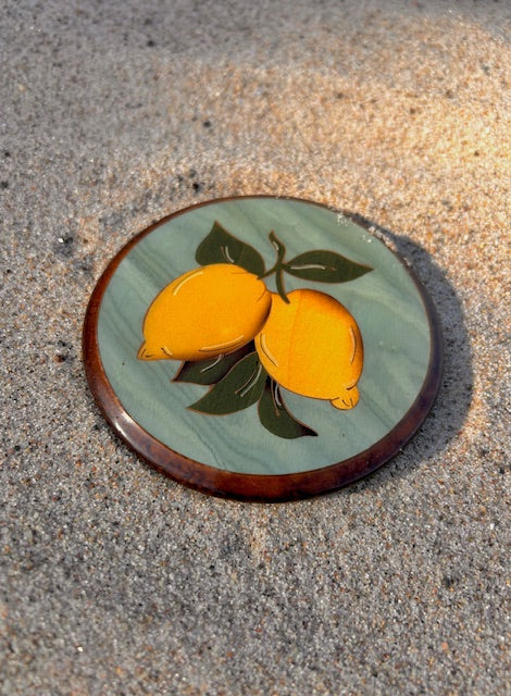 Italien wood coaster with lemons