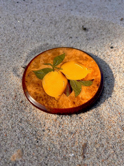 Italien wood coaster with lemons